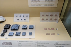 Various commercial weights, identifying and allotment tokens, and passports